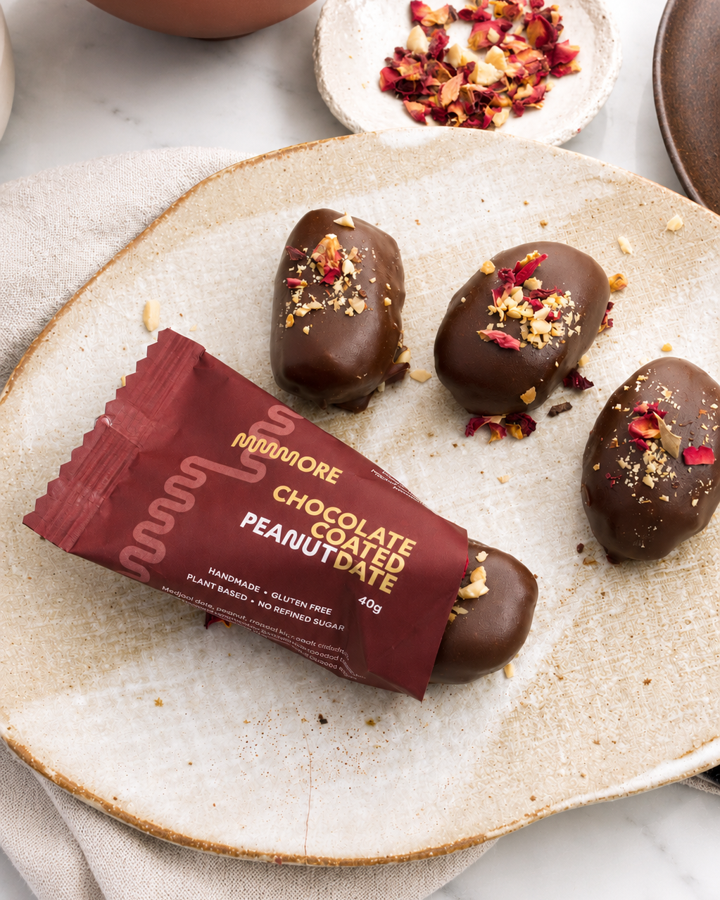 Mmmore Chocolate Coated Date Peanut single 40g