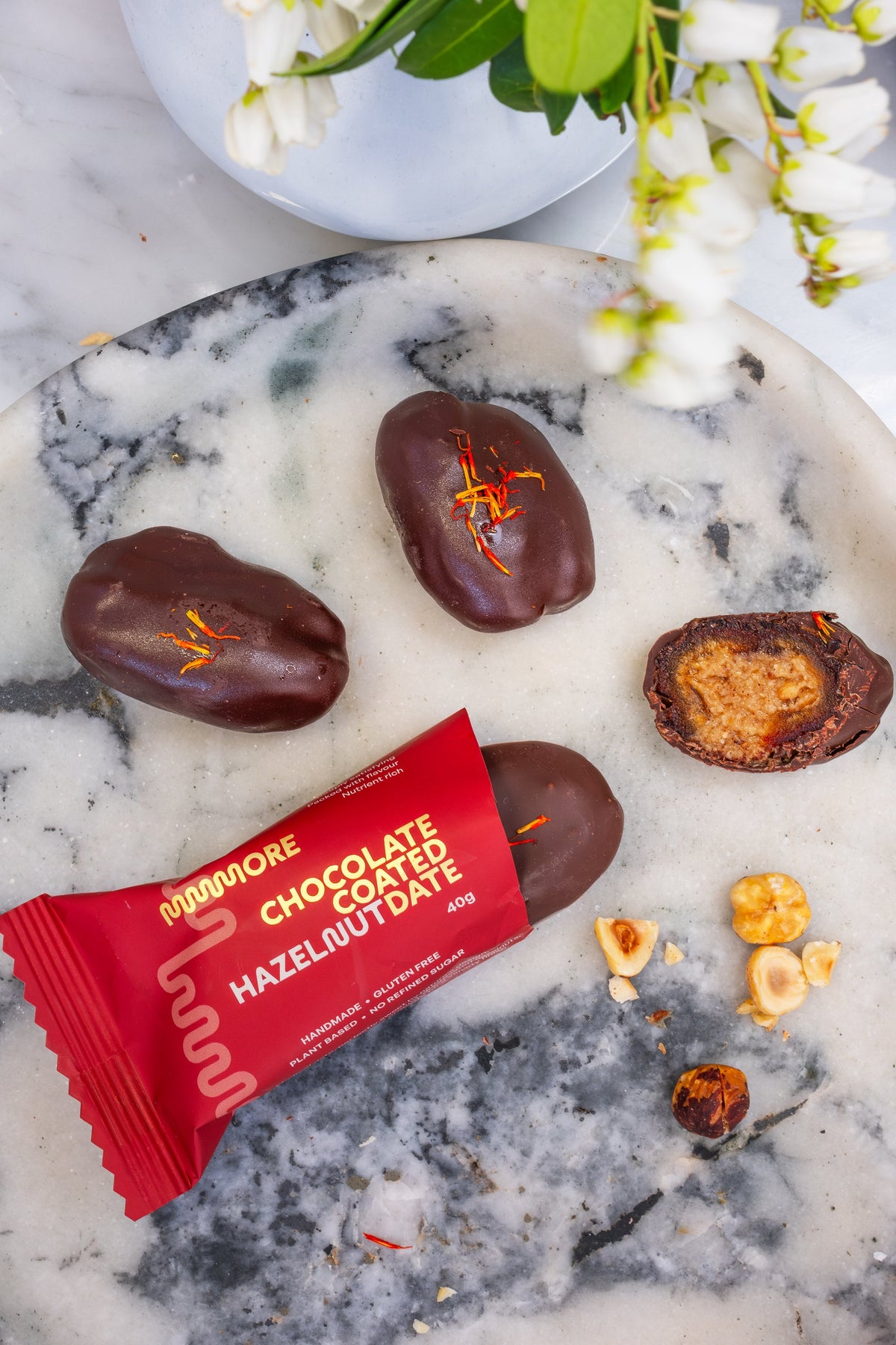 Mmmore Chocolate Coated Date Hazelnut single 40g