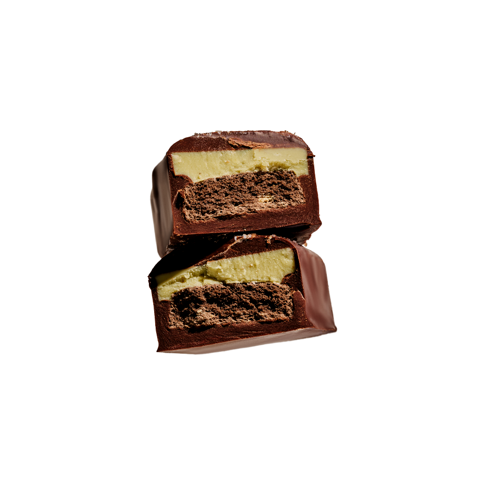 Loco Love Peppermint Cookie Crunch bar cut open showing the peppermint and cookie centre