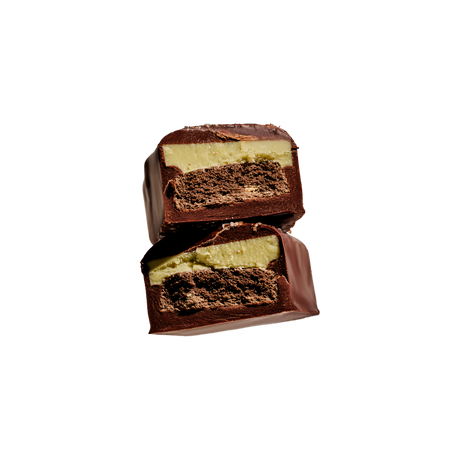 Loco Love Peppermint Cookie Crunch bar cut open showing the peppermint and cookie centre